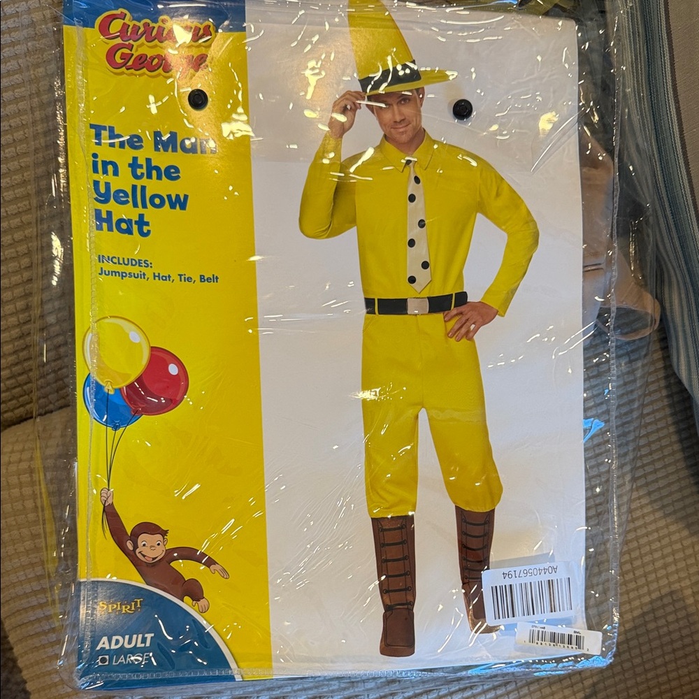 Curious George’s “Man in the yellow Hat costume